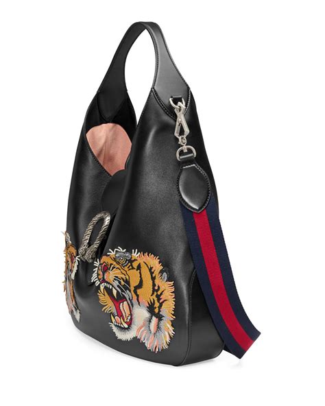 sacoche tigre gucci|Gucci shoulder bag.